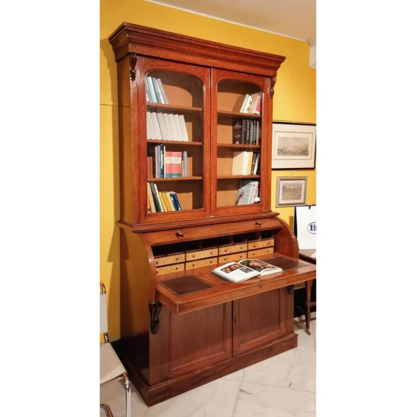 Antica “Bookcase” con ribalta a cilindro in mogano